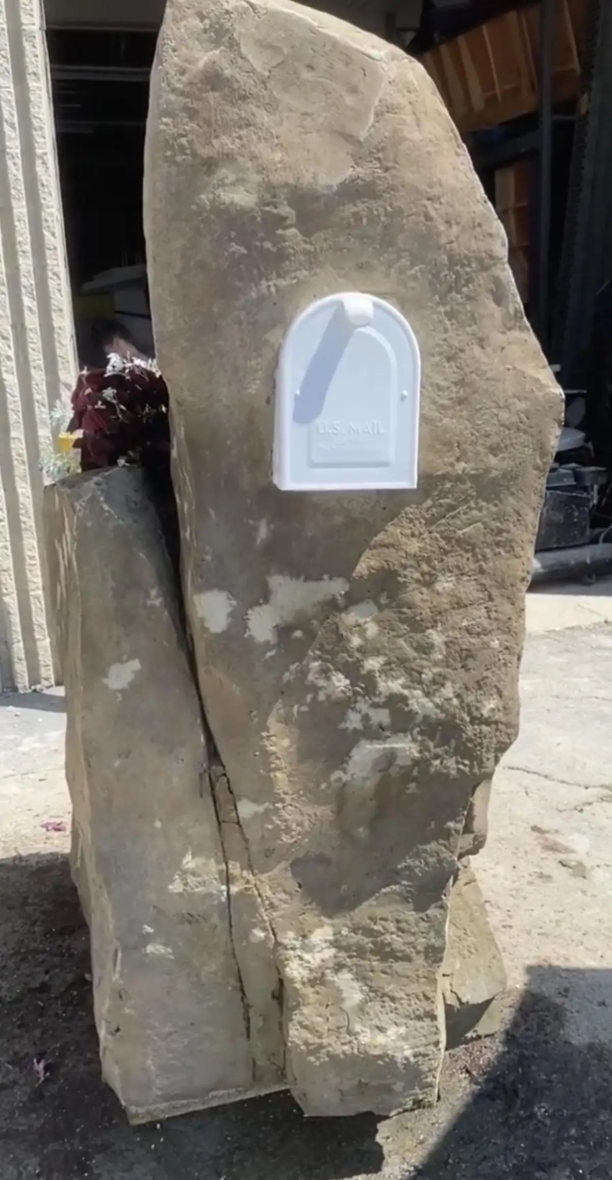 Residential hardscape installation with sculpted accents