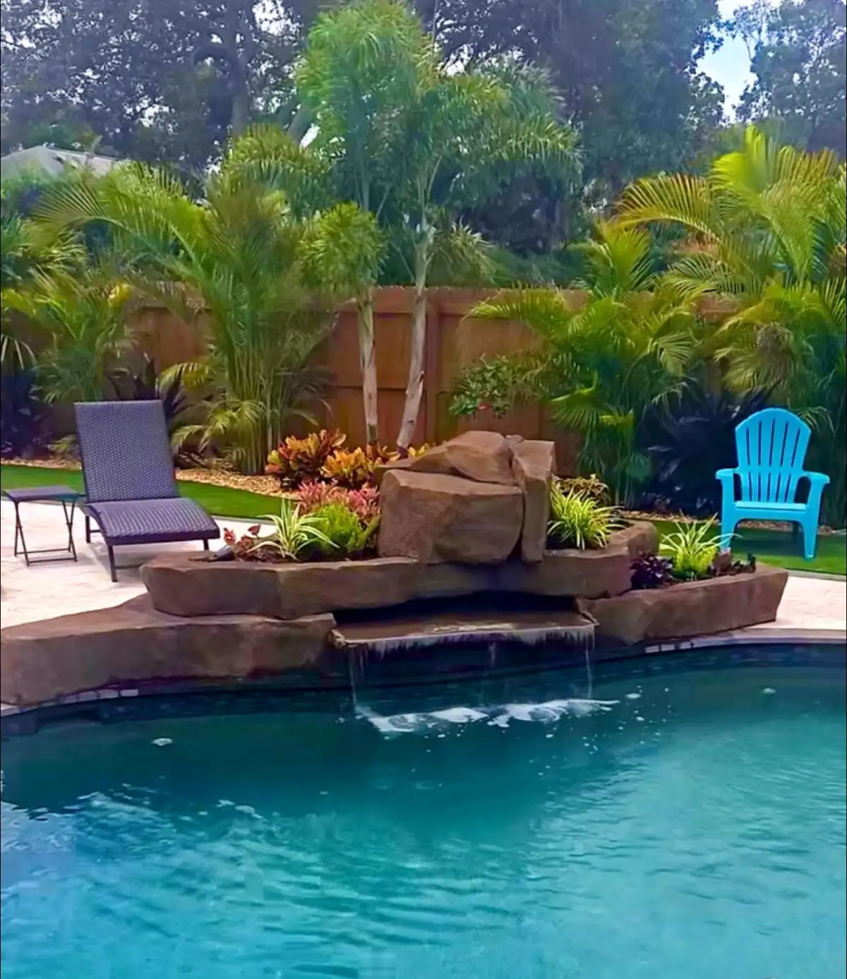 Hand-sculpted pool waterfall by Boulder Legacies