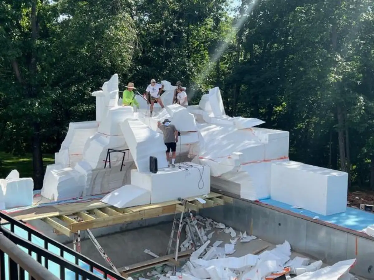 Waterfall being added to an existing residential pool