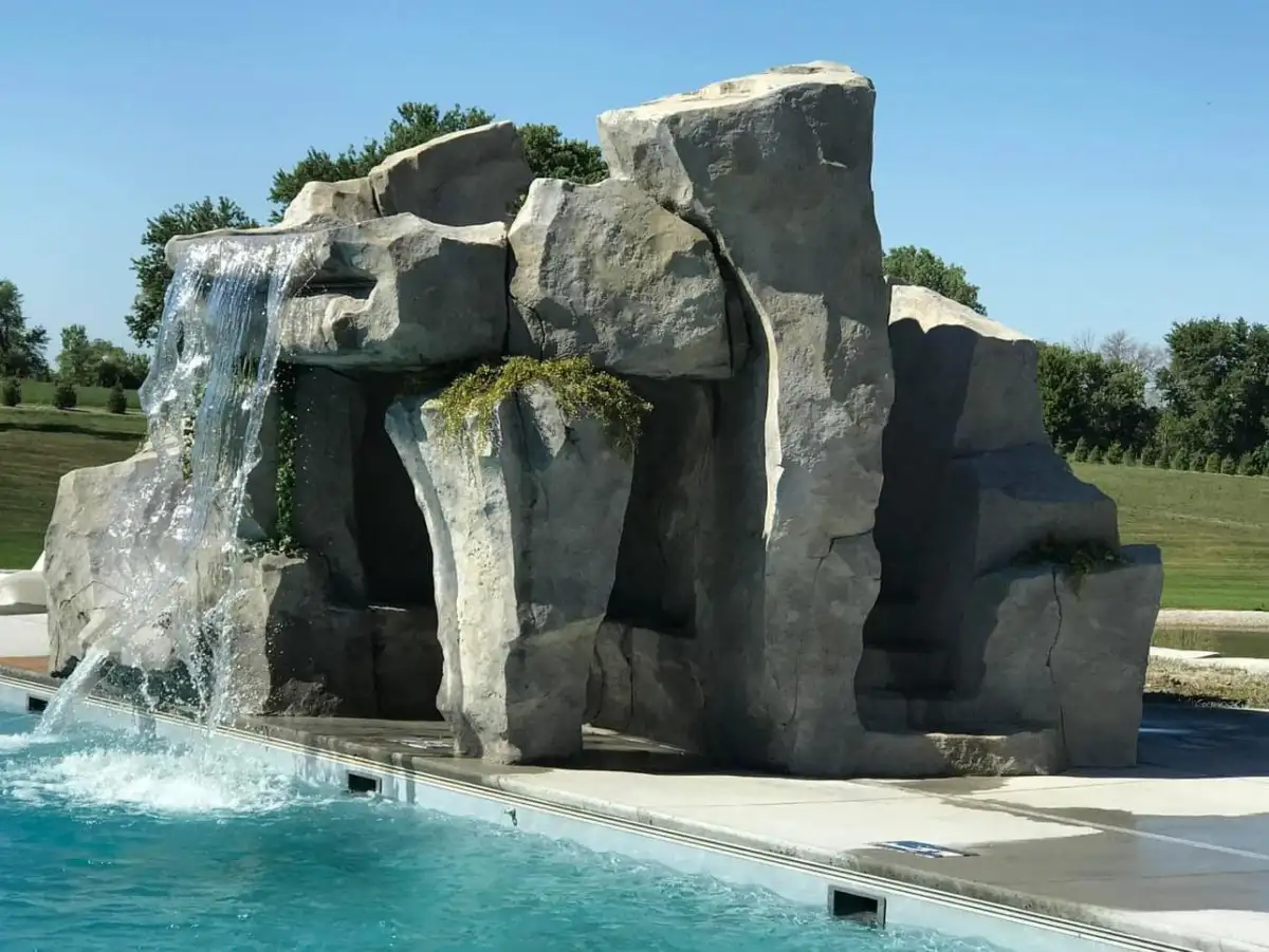 Custom residential pool waterfall with grotto opening