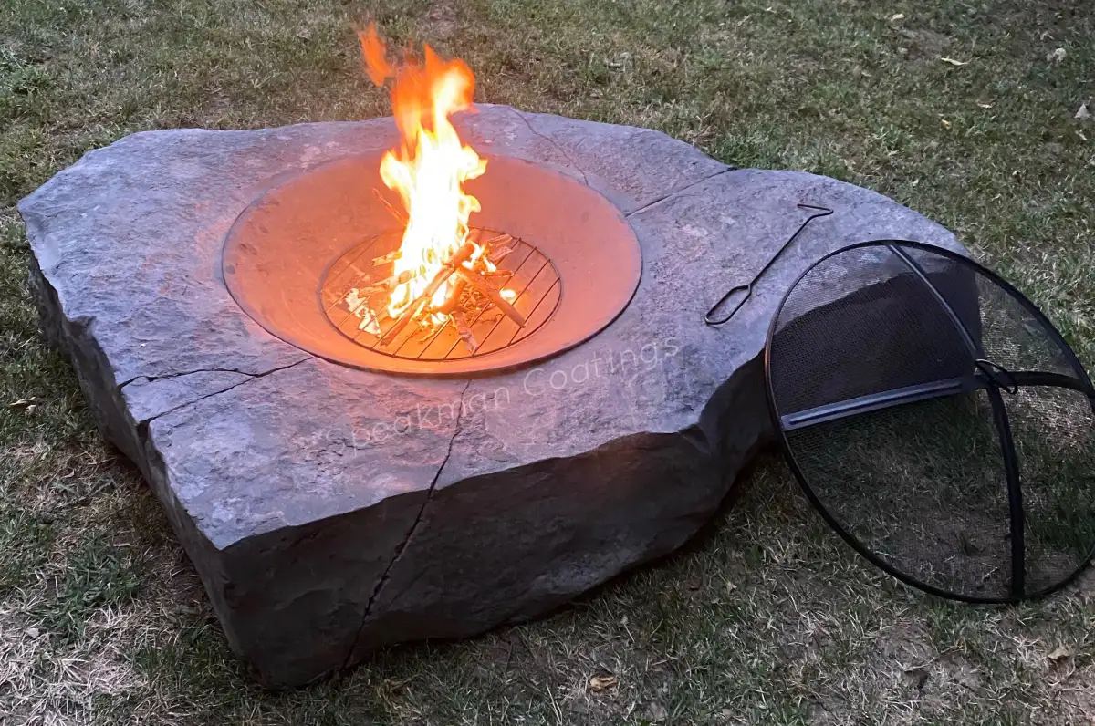 Custom hand-sculpted fire feature with natural flame integration