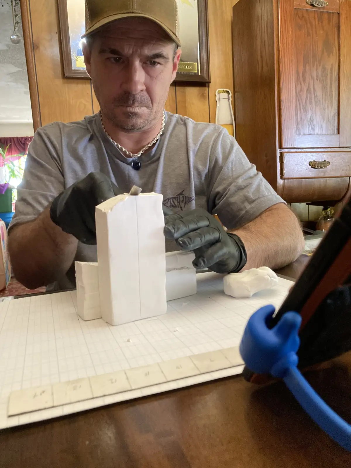 Hand-sculpted 1-inch-to-1-foot scale clay maquette for a custom pool waterfall design