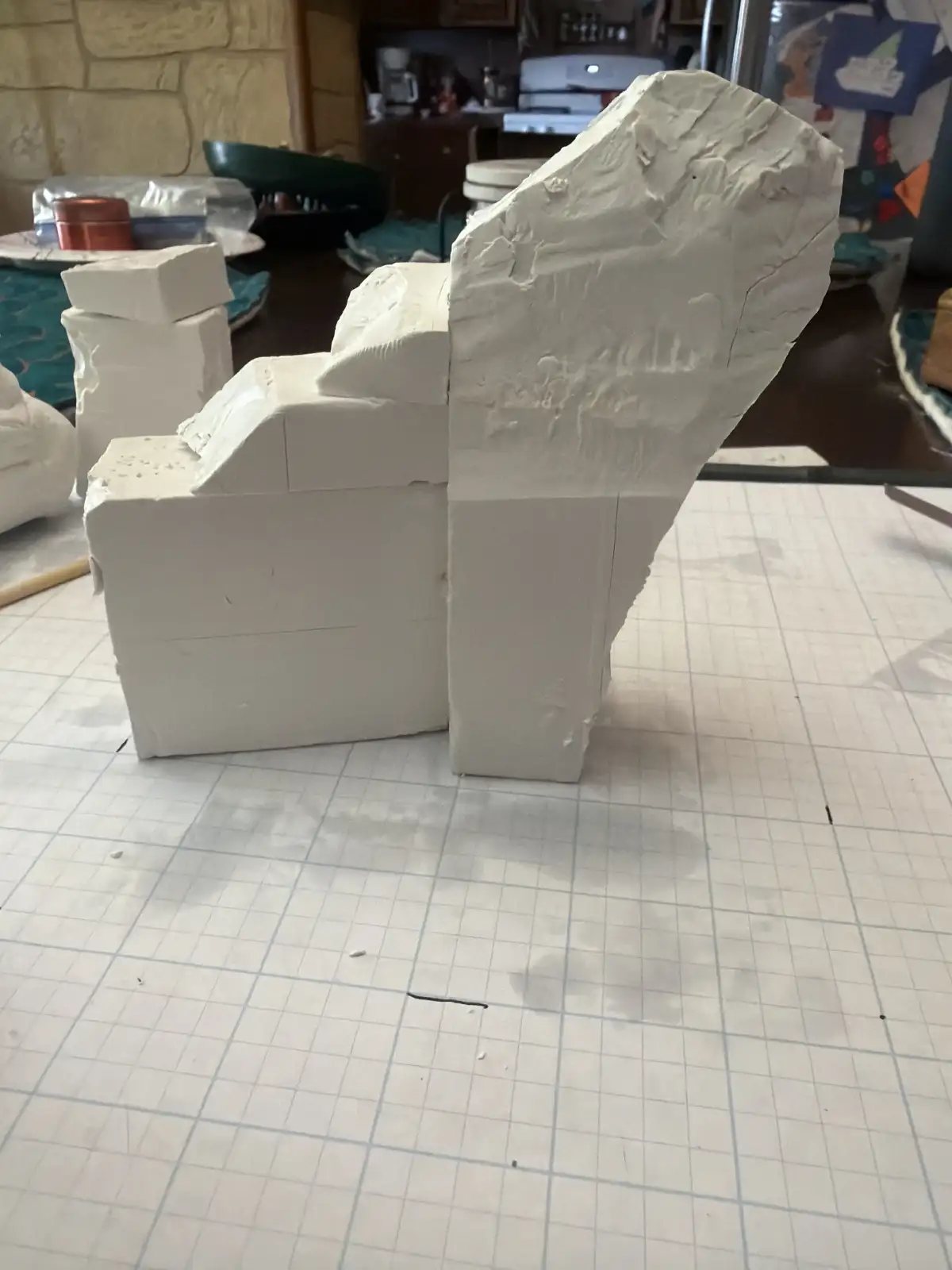 Waterfall maquette on measurement grid showing Boulder Legacies design precision