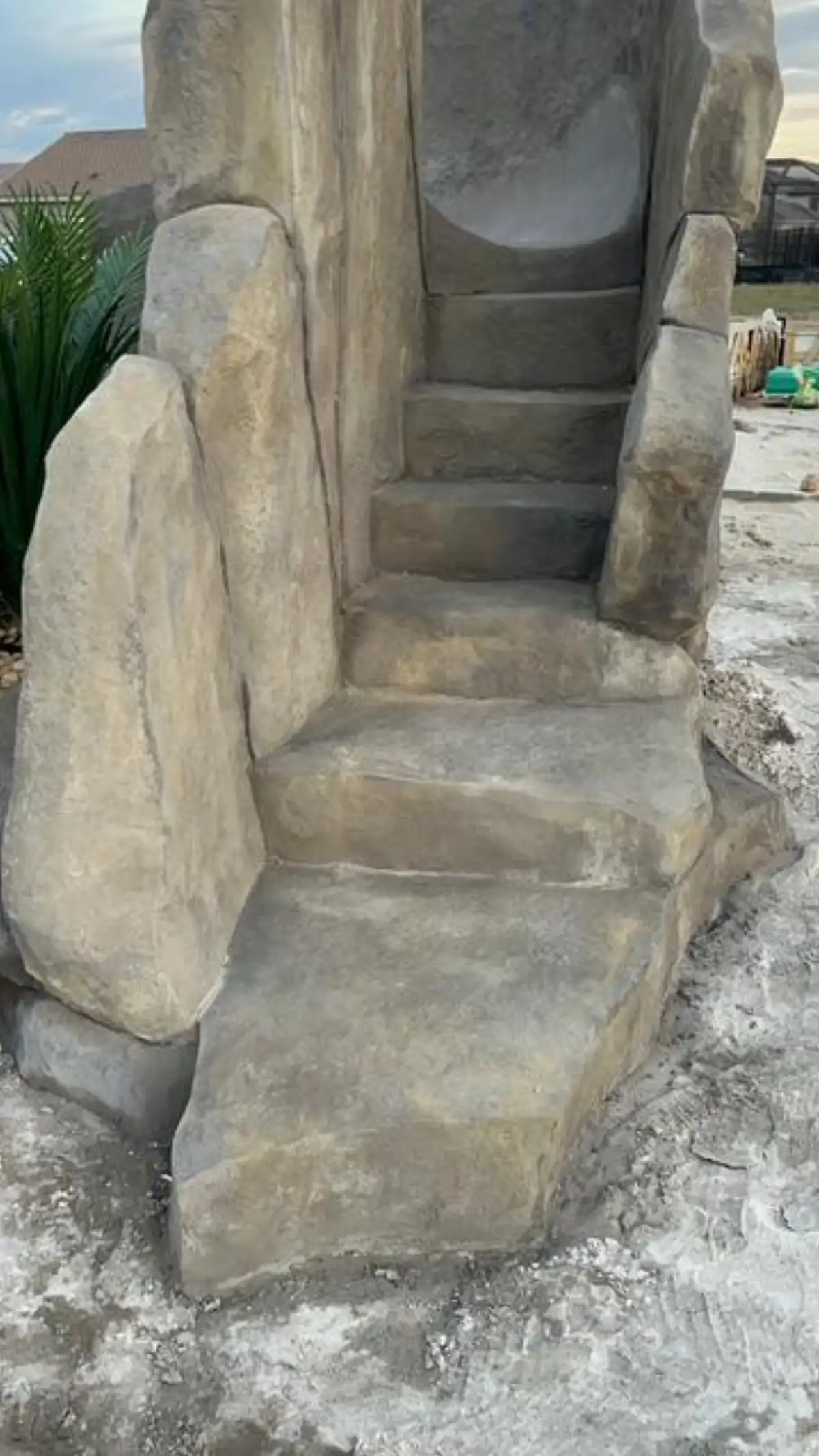 Polished concrete slide for Austin Texas luxury pool